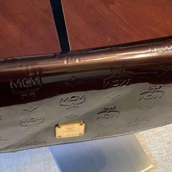 MCM Chocolate Embossed Clutch with Gold Chain - Picture 9 of 17